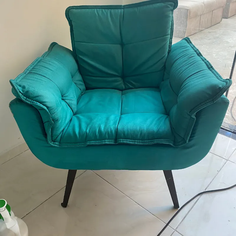 Poltrona verde depois da higienização da T.T Service